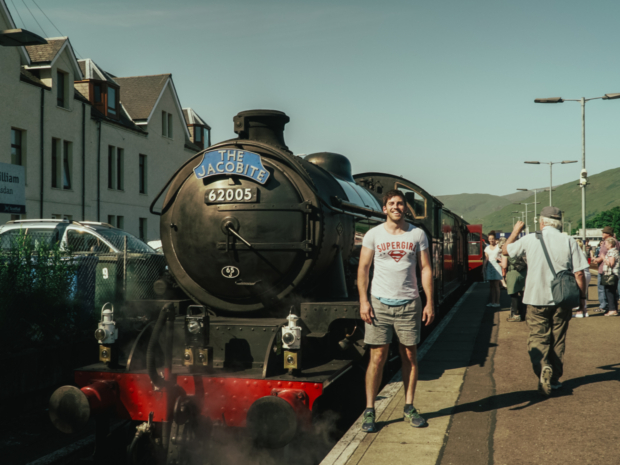 Man standing by Jacobite Steam Train