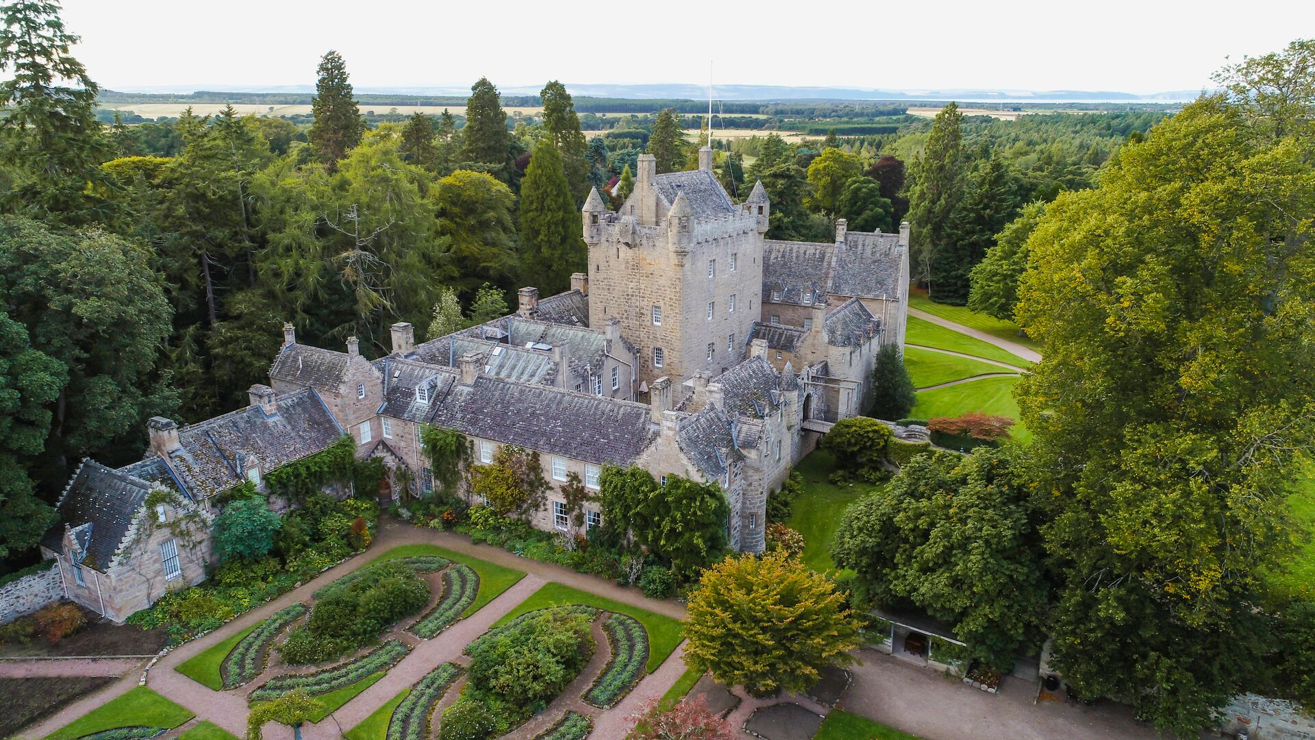 Aerial view of Cawdor Castle with its beautifully manicured gardens surrounding the estate