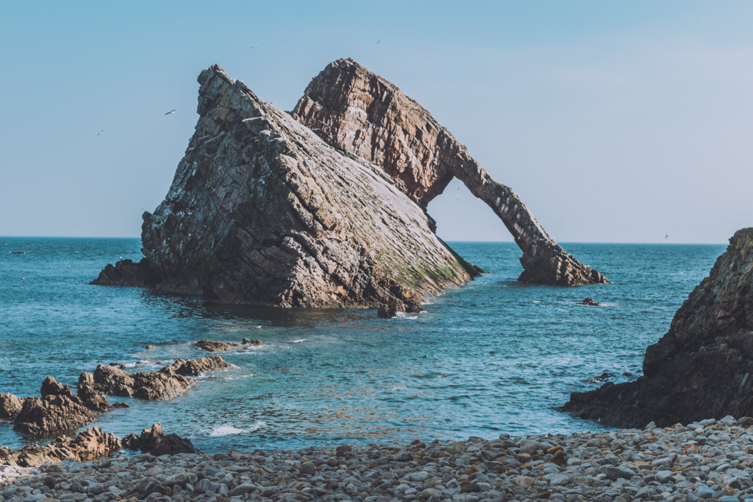Bow Fiddle Rock on the Moray Coast, a unique sea arch shaped by erosion