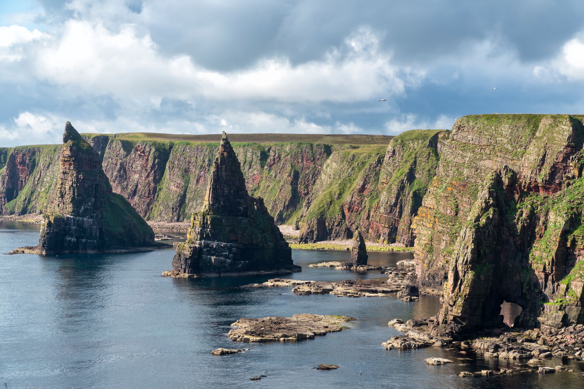 Sea stacks rising out of the ocean at Duncansby Head