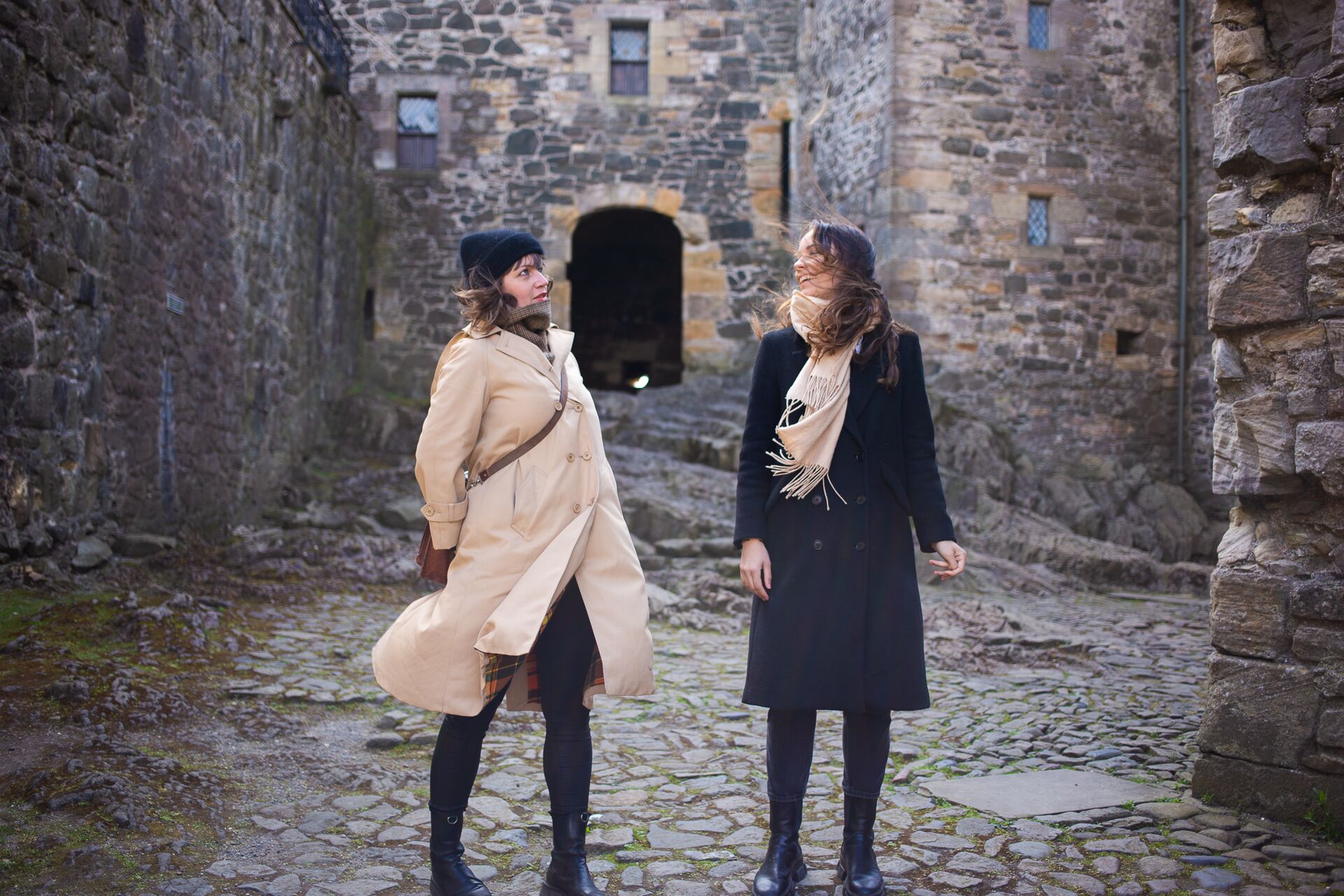 Two young female travellers at Blackness Castle